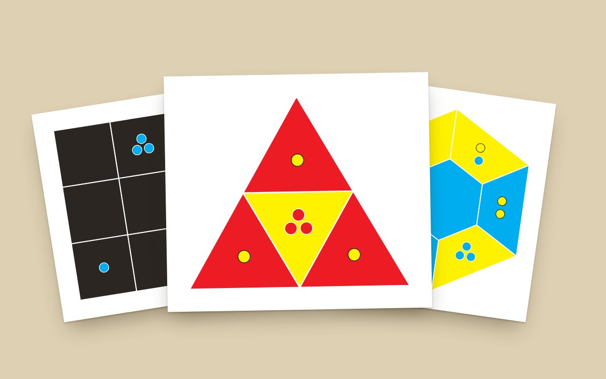Puzzle figures painted red, yellow and blue, with colored clue dots